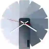 На картинке: Часы настенные Transformer Clock. Black & Monochrome на белом фоне