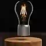 На картинке: Левитирующая лампа FireFly на белом фоне